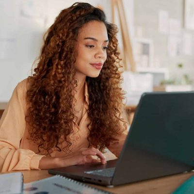 Black woman, documents or working on laptop planning, creative research or data analysis for marketing project management review. Business, typing corporate report, schedule or SEO calendar agenda.